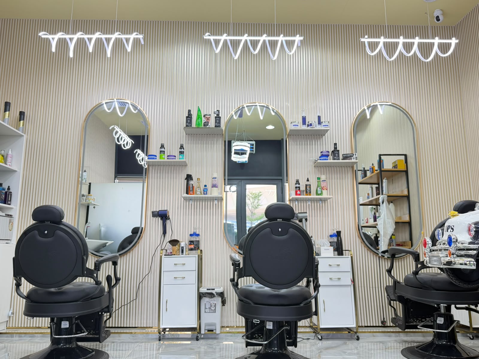 Grooming lounge and waiting area at Pro Look Gents Salon Business Bay